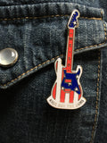 metal guitar pin in red, white and blue hard enamel with a black and white photo card back