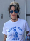 hip woman in white on blue MOTOR CITY FIVE tee shirt