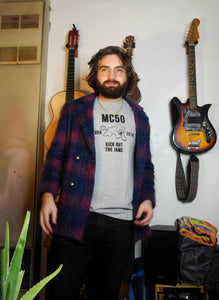 Gerry Garcia type wearing grey high school MC50 "kick out the jams" t shirt